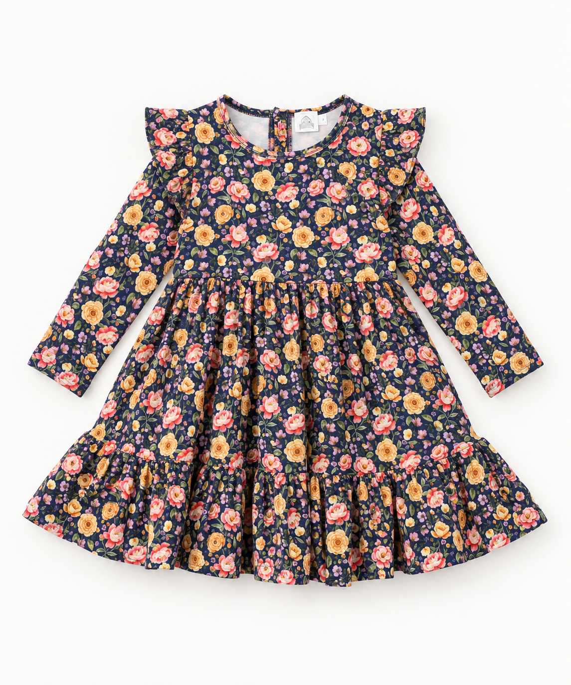 A long-sleeve children's dress with a dark navy blue background and a dense floral print featuring yellow, orange, pink, and red flowers, laid flat against a white background. This is from the brand Little Acres co