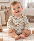 Baby wearing Little Acres Co garden print organic cotton long sleeve bodysuit. Australian brand 