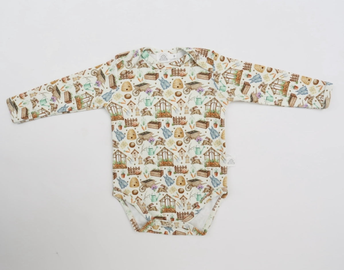 Little Acres Co garden print long sleeve baby bodysuit in GOTS organic cotton