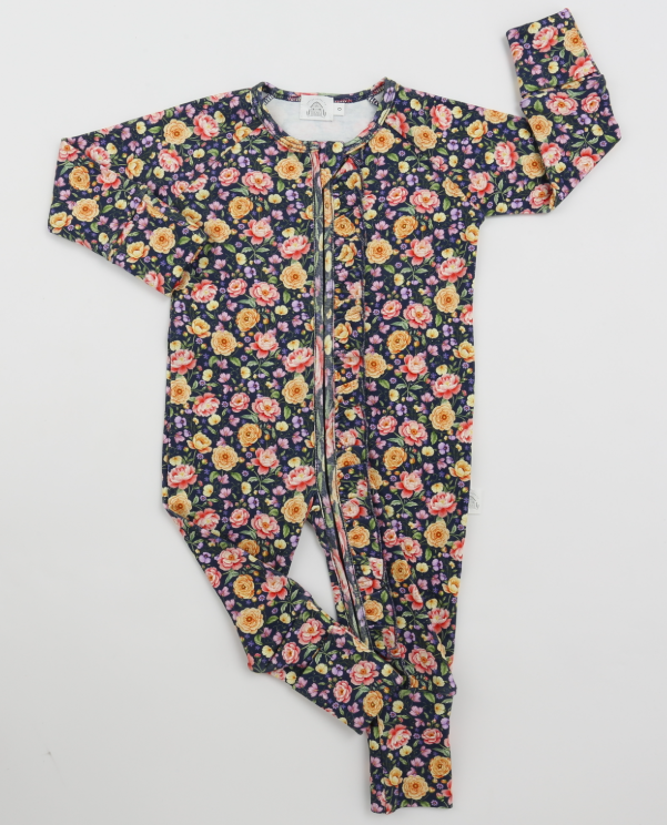 Little Acres Co navy floral ruffle baby growsuit in GOTS organic cotton